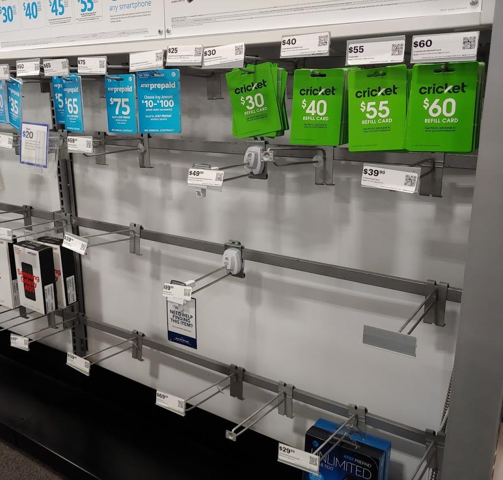 AT&T And Cricket Wireless Near Empty Display Racks At Best Buy (Photo Via Wave7 Research)