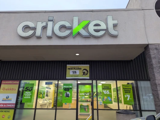 Cricket Wireless storefront in Denver showing phone plan deals and phone deals