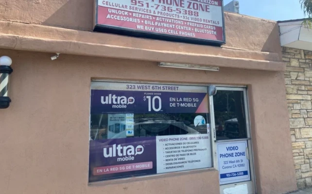 Prepaid Wireless Dealer Storefront with Ultra Mobile promo signage