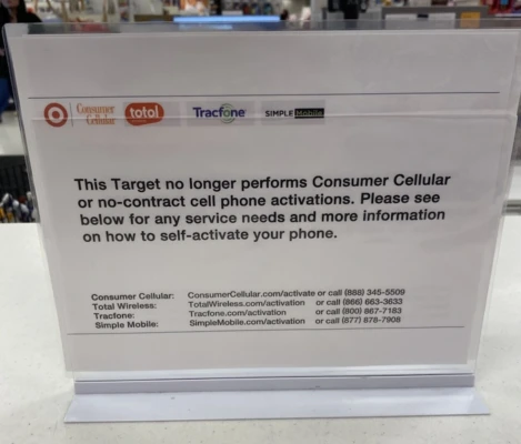 In store Target signage that says Target no longer activates Consumer Cellular or no-contract phone activations